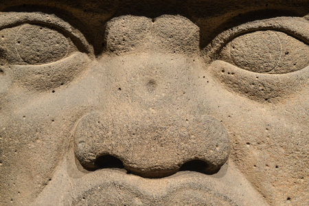 An Olmec colossal head sculpted from a large basalt boulder  The head dates from at least before 900 BC and is a distinctive feature of the Olmec civilization of ancient Mesoamerica のeditorial素材
