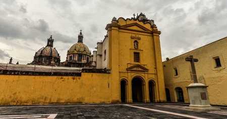 Church of Santa Catarina  Iglesia de Santa Catarina   A 16th century, bright yellow, baroque church in the Coyoacan district of Mexico City の写真素材