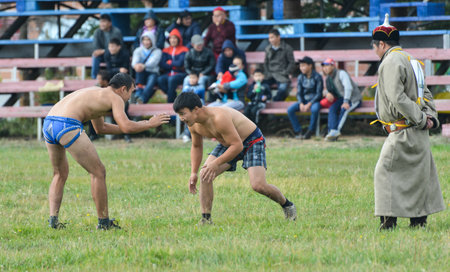 IVOLGINSKY REGION, BURYATIA - SEPTEMBER 9, 2013  Three Games of a Man - Eleventh Annual Wrestling event in Ulan-Ude  Traditional Mongolian-style wrestling のeditorial素材