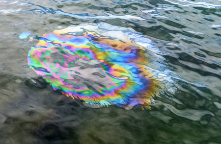 Oil Slick the from USS Arizona Memorial Pearl Harbor Hawaii  Positioned directly over the remains of the ship that continues to release oil の写真素材