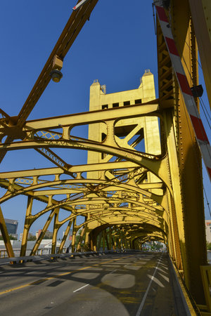 The Tower Bridge (1935) is a vertical lift bridge that crosses the Sacramento River in Sacramento, California.の写真素材
