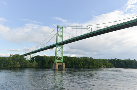 The Thousand Islands Bridge. An international bridge system constructed in 1937 over the Saint Lawrence River connecting northern New York in the United States with southeastern Ontario in Canada.の写真素材