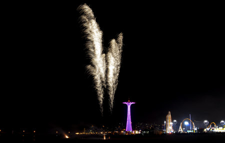 Coney Island Fireworks on the beach on a summer evening.の写真素材