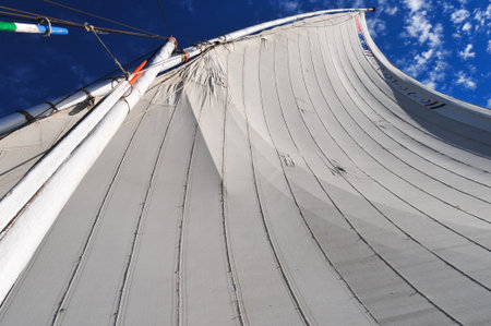 Sails of an Egyptian Felucca along the Nile River.