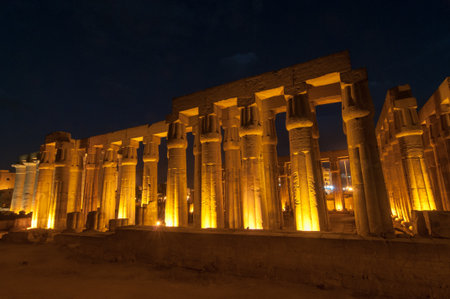Illuminated Luxor Temple. The Peristyle Court of Amenhotep III and Hypostyle Hall of Egypt.のeditorial素材