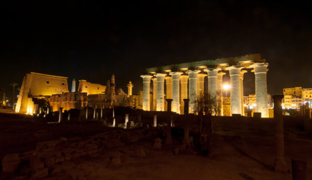 Illuminated Luxor Temple. The Peristyle Court of Amenhotep III and Hypostyle Hall of Egypt.のeditorial素材