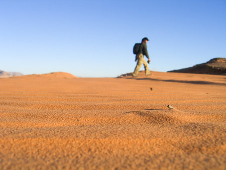 Tourist traveling along the sands of Wadi Rum, Jordan.の写真素材