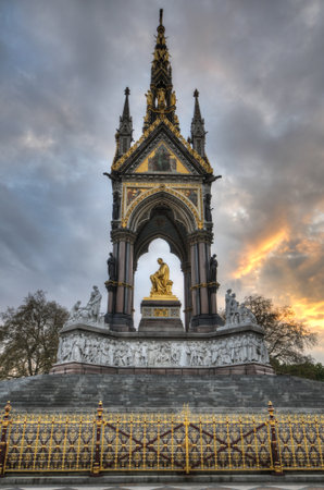 The London landmark in Hyde Park contrasting the neo-gothic monument against a threatening sky. The memorial was built by Queen Victoria in remembrance of her husband, Prince Albert.のeditorial素材