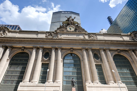 NEW YORK, NEW YORK  - August 17, 2013: Grand Central Terminal with MetLife Building of New York in the background. Grand Central Terminal is a commuter rail terminal station at 42nd Street and Park Avenue.のeditorial素材