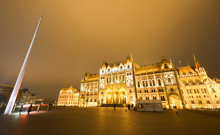 Parliament Building in Budapest, Hungary at night during the changing of the guards.のeditorial素材