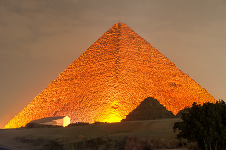 CAIRO, EGYPT - JANUARY 1, 2009: Giza pyramid and Sphinx light up for magical sound and light show.のeditorial素材