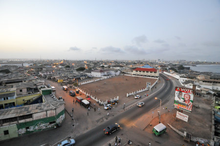 ACCRA, GHANA - APRIL 29, 2012: Panoramic view of Accra, Ghana in the evening from the Jamestown Lighthouse.のeditorial素材