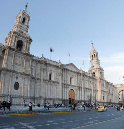 AREQUIPA, PERU - August 11, 2006: Main square of Arequipa with church. Arequipa's Plaza de Armas is one of the most beautiful in Peru.