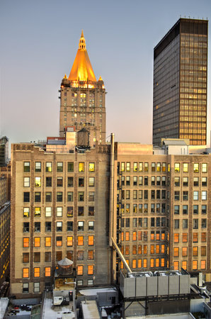 New York City skyline with urban skyscrapers at sunset.の写真素材