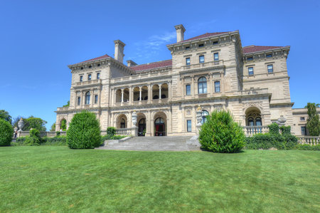 NEWPORT, RHODE ISLAND - AUGUST 8, 2013: The Breakers Mansion - a national historic landmark, built by Cornelius Vanderbilt of the Gilded Age, as seen on the Cliff Walk in Newport.のeditorial素材