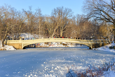 NEW YORK, NEW YORK - FEBRUARY 9, 2013: Bow Bridge in Central Park, NYC after a snow storm.のeditorial素材
