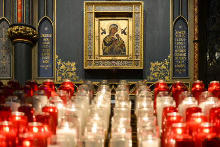 MONTREAL, CANADA - FEBRUARY 23, 2013: Interior of Notre-Dame basilica cathedral and candles in Montreal, Canada. The church's Gothic Revival architecture is among the most dramatic in the world.のeditorial素材