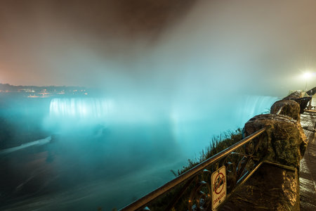 Niagara Falls from Canada at night as it is illuminated.の写真素材