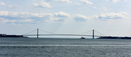 View of the length of the Verrazano Bridge connecting Brooklyn to Staten Island, New York.の写真素材