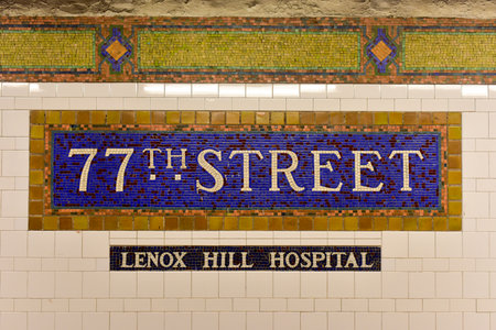 New York, New York - 77th Street Subway Station Mosaic Sign in New York City.のeditorial素材