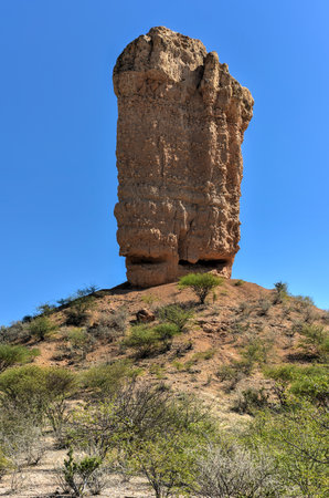 The Vingerklip (Rock Finger) in Namibia is a geological leftover of the Ugab Terrace. The Rock Finger stands on a hill top and has a height of 929 m above sea level, the rock itself is 35 meters high.の写真素材