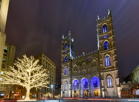 Montreal Notre-Dame Basilica in Montreal, Quebec, Canada at night.  Notre-Dame Basilica (French: Basilique Notre-Dame de Montreal).のeditorial素材