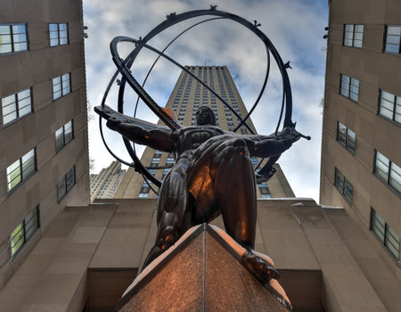 New York - January 24, 2016: Snow covered Atlas Statue at Rockefeller Center in New York. The Atlas Statue is a bronze statue in front of Rockefeller Center in midtown Manhattan, New York City.のeditorial素材