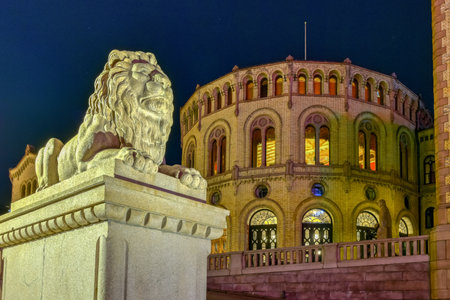 The Storting building (Norwegian: Stortingsbygningen) at night. It is the seat of the Storting, the parliament of Norway, located in central Oslo.のeditorial素材