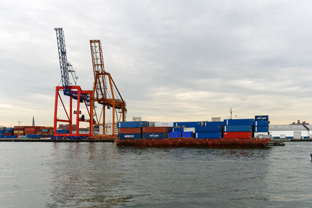 Industrial cargo cranes along the coast of Brooklyn, New York.