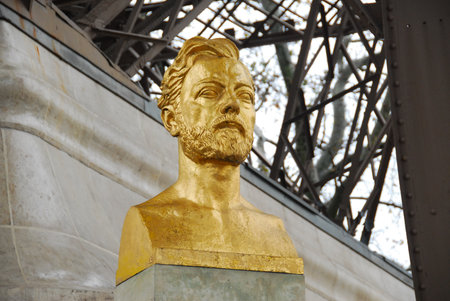 Bust of Gustave Eiffel at the base of the Eiffel Tower in Paris, France.の写真素材