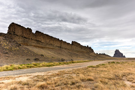 Shiprock is a monadnock rising nearly 1,583 feet above the high-desert plain of the Navajo Nation in San Juan County, New Mexico, United States.の写真素材