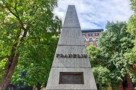 Monument to Benjamin Franklin in the Granary Burying ground in Boston in the summer.