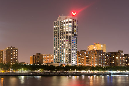 Hoboken, New Jersey - August 22, 2012: View of the W Hotel in Hoboken, New Jersey across the Hudson from New York City.のeditorial素材
