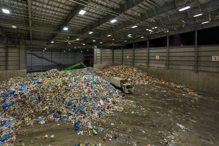Brooklyn, New York - November 7, 2016: Recycling heaps at the Sims Municipal Recycling Center. It is a State-of-the-Art Material Recovery Facility in Sunset Park, Brooklyn, New York.のeditorial素材
