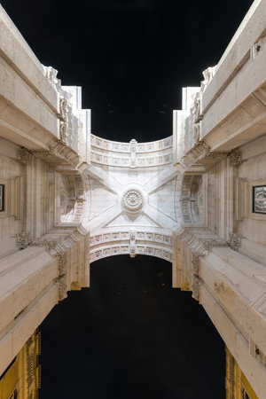 Augusta Street Triumphal Arch in the Commerce Square, Praca do Comercio or Terreiro do Paco at night in Lisbon, Portugal.の写真素材