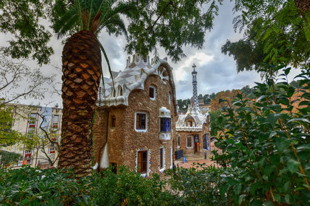 Ginger Bread House in Park Guell in Barcelona, Spain. It is a public park system composed of gardens...