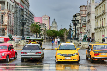 Havana, Cuba - January 7, 2016: View along boulevard Paseo del Prado (Paseo de Marti) and the National Capitol Building in Havana, Cuba.のeditorial素材