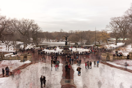 New York City - February 11, 2017: Bethesda Fountain on a winter's day surrounded by tourists in Central Park, New York.のeditorial素材