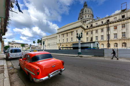 Havana, Cuba - January 8, 2017: Cars parking in the front of the National Capital Building (El Capitolio) in Havana, Cuba.のeditorial素材