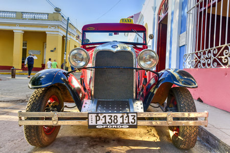 Trinidad, Cuba - January 12, 2017: Classic Ford in the old part of the streets of Trinidad, Cuba.