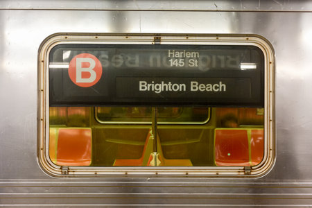 Brooklyn, New York - March 24, 2017: New York City subway train traveling between Brighton Beach, Brooklyn and Harlem 145 St, Manhattan.のeditorial素材