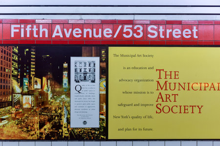 Brooklyn, New York - March 24, 2017: Sign pointing to the 6 train at the 53rd Street Station of the New York City subway system.のeditorial素材