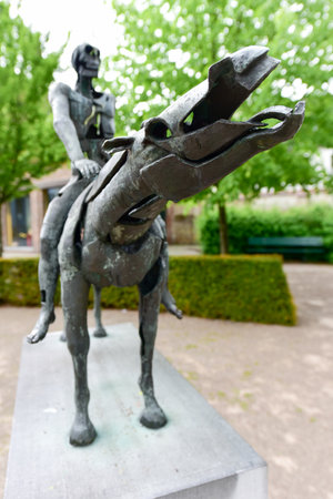 Sculpture group The Four Horsemen of the Apocalypse by Rik Poot at the Hof Arents in Bruges / Brugge, West Flanders, Belgiumのeditorial素材