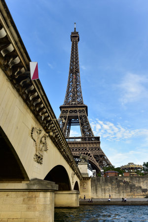 The Eiffel Tower along the Seine River in Paris, France.の写真素材