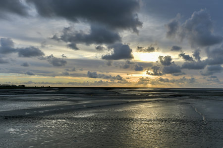 Sunset by Mont Saint-Michel cathedral on the island, Normandy, Northern France, Europe.の写真素材