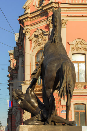 View of the Horse Tamers monument by Peter Klodt on the Anichkov Bridge in Saint Petersburg, Russia.の写真素材