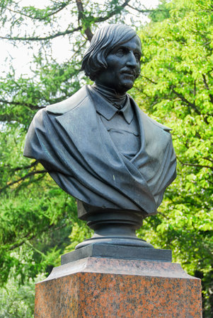 Monument to Nikolai Vasilievich Gogol (Ukrainian - Russian dramatist, novelist) in front of the Admiralty building in Saint Petersburg, Russiaのeditorial素材