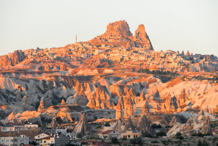Goreme village, Turkey at sunrise. Rural Cappadocia landscape. Stone houses in Goreme, Cappadocia. Countryside lifestyle.の写真素材