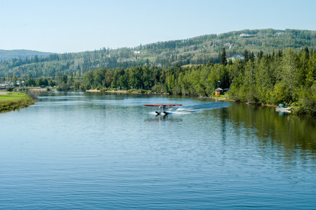 Seaplane landing on the water in Alaska