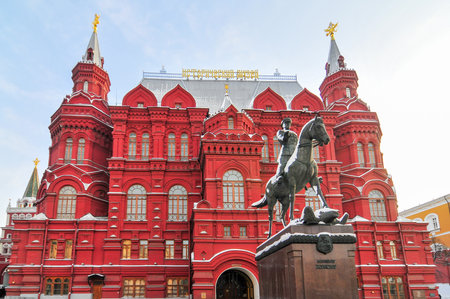 State Historical Museum (in Russian) and monument to General Zhukov (Russian inscription) in Moscow, Russiaのeditorial素材